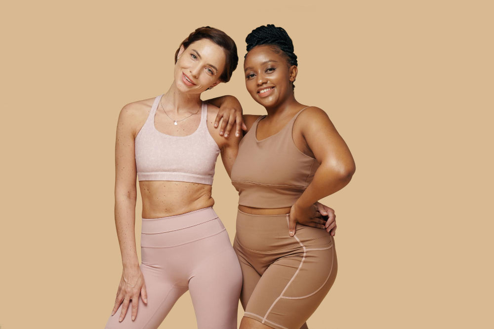 Happy friends with different body types