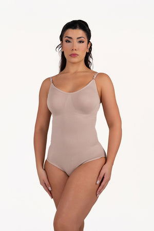 Model wearing the beige women's shapewear bodysuit butt lifter